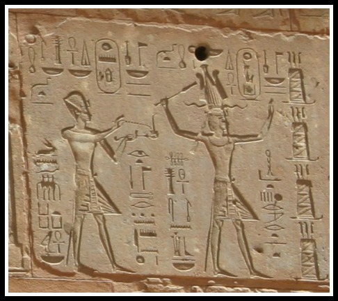 Thutmose III and Hatshepsut- she is the taller figure decked out in Pharaoh garb.