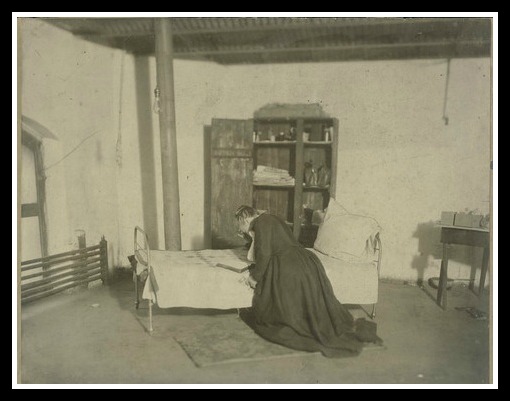 Praying during one of her maaaany days in jail. (Courtesy Kansas Historical Society)