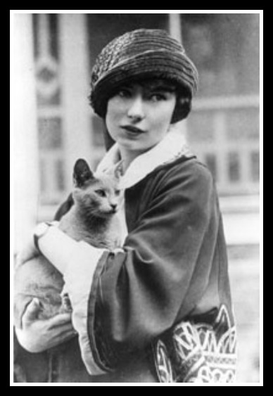 Margaret Mitchell with a fabulous hat...and a cat. (courtesy Media Services News)