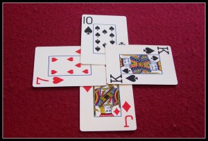 This kind of card trick doesn't have any illusion-coolness...it's just part of the game of Whist