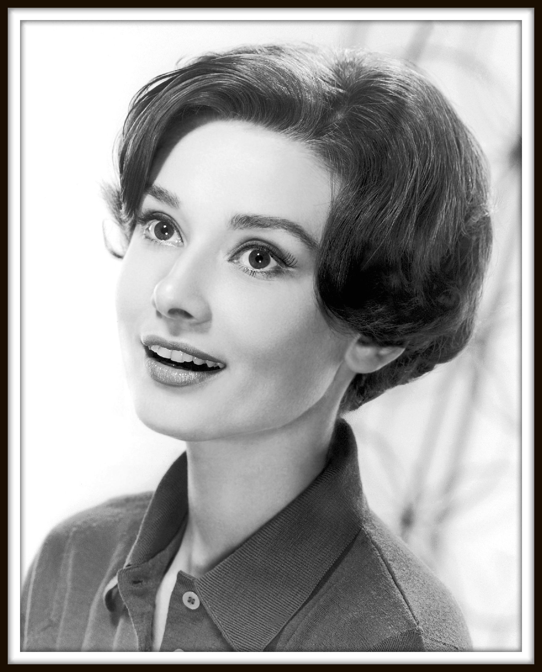 Audrey Hepburn checking a bag. British actress Audrey Hepburn